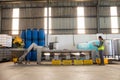 Workers working together near production line Royalty Free Stock Photo