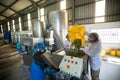 Workers working together near production line Royalty Free Stock Photo