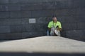 a workerseating alone in shade Royalty Free Stock Photo