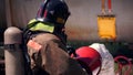 Workflow. Clip. Firefighters in uniform check the equipment and pour foam and water. Royalty Free Stock Photo