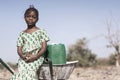 Working African ethnicity Infant getting pure Water in a natural environment