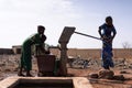 Working.African Ethnicity Young Women Carrying Natural Water for lack of water symbol