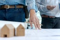 working with architect equipment and home wood model Royalty Free Stock Photo