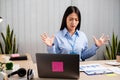 Working Asian women feel stressed, tired from work, migraine headaches from hard work while working at the office