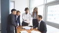 Working atmosphere in the office. employees to view documents in the workplace. group of business people discussing Royalty Free Stock Photo