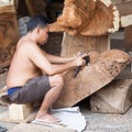 Working Balinese carver in workshop