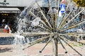 Working ball-shaped fountain during the summer day