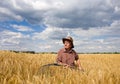 Working in barley field Royalty Free Stock Photo