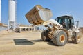 Working with caterpillar wheel dozer on site