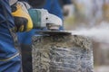 Working circular saw outdoors, sawdust flying around Royalty Free Stock Photo