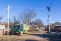 Working electricians Kubanenergo and Rosseti employees cut tree branches and eliminate the breakage of the electric network line Royalty Free Stock Photo