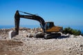 Working excavator building a house on the Lycian Trail in Turkey.