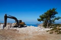 Working excavator building a house on the Lycian Trail in Turkey.