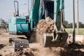 Working Excavator Tractor Digging A Trench. Royalty Free Stock Photo