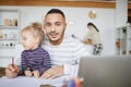 Working Father Posing with Cute Little Girl