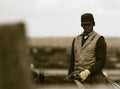 Working the Feedlot. An American Cowboy Royalty Free Stock Photo