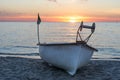 A working fishing boat on the beach at Algeria on the Mediterranean coast . A boat on the Beach on the sands of the seashore with Royalty Free Stock Photo