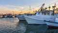 Working fishing boats at dawn in Rockport-Fulton harbor, before Royalty Free Stock Photo