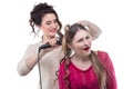 Working hairstylist and surprised woman