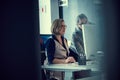 Working hard right through the night. two businesspeople working late in an office. Royalty Free Stock Photo