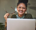 Working hard to beat the deadline. Portrait of an attractive young woman working on her laptop in the office.