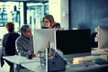 Working hard to knockout their deadlines. a group of businesspeople working late in an office. Royalty Free Stock Photo