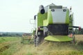 Working harvesting combine in field Royalty Free Stock Photo