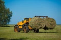 Working Harvesting Combine in the Field of Wheat Royalty Free Stock Photo