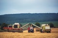 Working Harvesting Combine in the Field of Wheat Royalty Free Stock Photo