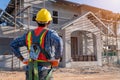 Working at height equipment for worker to install the roof. Fall arrestor device for worker with hooks for safety body harness in Royalty Free Stock Photo