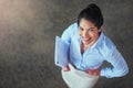 Working her way up the corporate ladder. High angle portrait of a stylish young businesswoman in an office. Royalty Free Stock Photo