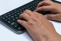 Working at home with laptop men writing a blog. Typing on a keyboard. Programmer or computer hacker Royalty Free Stock Photo