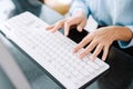 Working at home with laptop woman writing a blog. Female hands on the keyboard Royalty Free Stock Photo