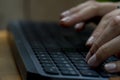 Working at home with laptop woman writing a blog. Female hands on the keyboard Royalty Free Stock Photo