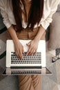 Working at home with laptop woman writing a blog. Female hands on the keyboard Royalty Free Stock Photo