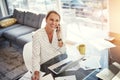 Working from home is what she loves. a mature businesswoman working from her home office. Royalty Free Stock Photo