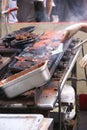 Working a hot grill at Seattle Street Fair Royalty Free Stock Photo