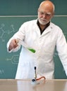 Working in a laboratory with a Bunsen burner Royalty Free Stock Photo