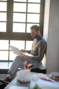 Bearded man working on laptop while having deadline Royalty Free Stock Photo