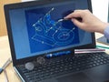 Working at laptop designing 3d print piece