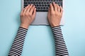 Working on laptop. Woman working on computer. Woman`s hands typing on laptop.