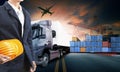 Working man and container truck ,ship in port and freight cargo Royalty Free Stock Photo