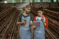 working man and woman disappointed looking at tablet screen together Royalty Free Stock Photo