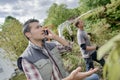 Working man outdoors on telephone Royalty Free Stock Photo