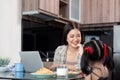 Working mom work from home office. Happy mother and daughter feed snacks to each other. businesswoman and cute child Royalty Free Stock Photo