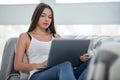 Serious freelancer working on her laptop at home Royalty Free Stock Photo