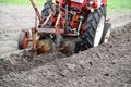 Working old-time potato grubber harvesting potatoes