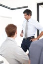 Working it out as a team. a group of business people having a financial meeting in a boardroom. Royalty Free Stock Photo