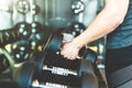 Working out with dumbbell weights at the gym.Fitness men exercising are lifting dumbbells. Fitness muscular body Royalty Free Stock Photo