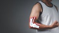 After working out, a man dressed in sportswear stretches. and display arm bones and muscles that have been harmed as a result of Royalty Free Stock Photo